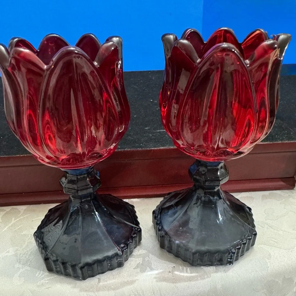 Pair of tulip-shaped candle holders, designed to hold tea lights or small candle